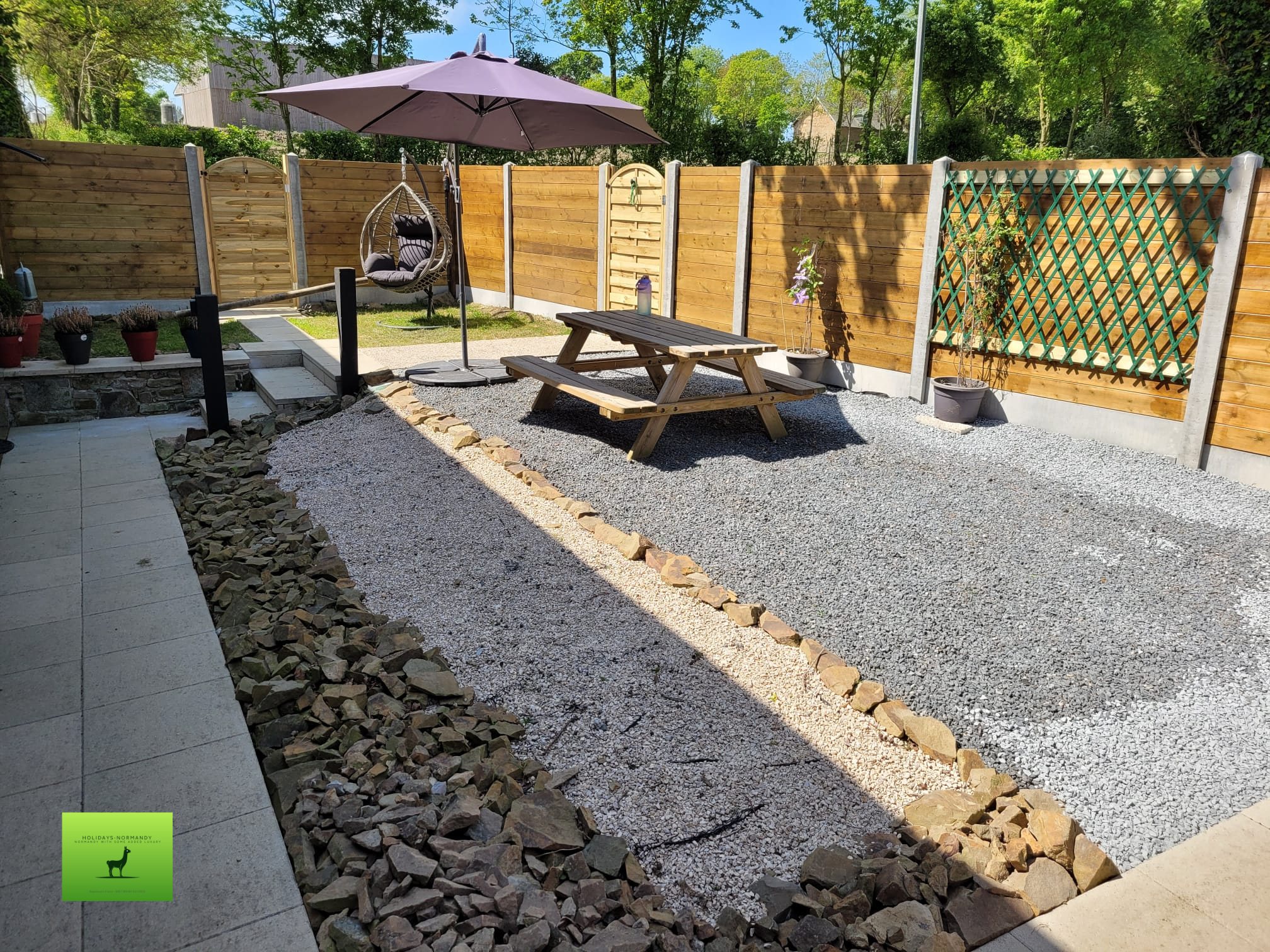 Secure private garden with dining area and BBQ