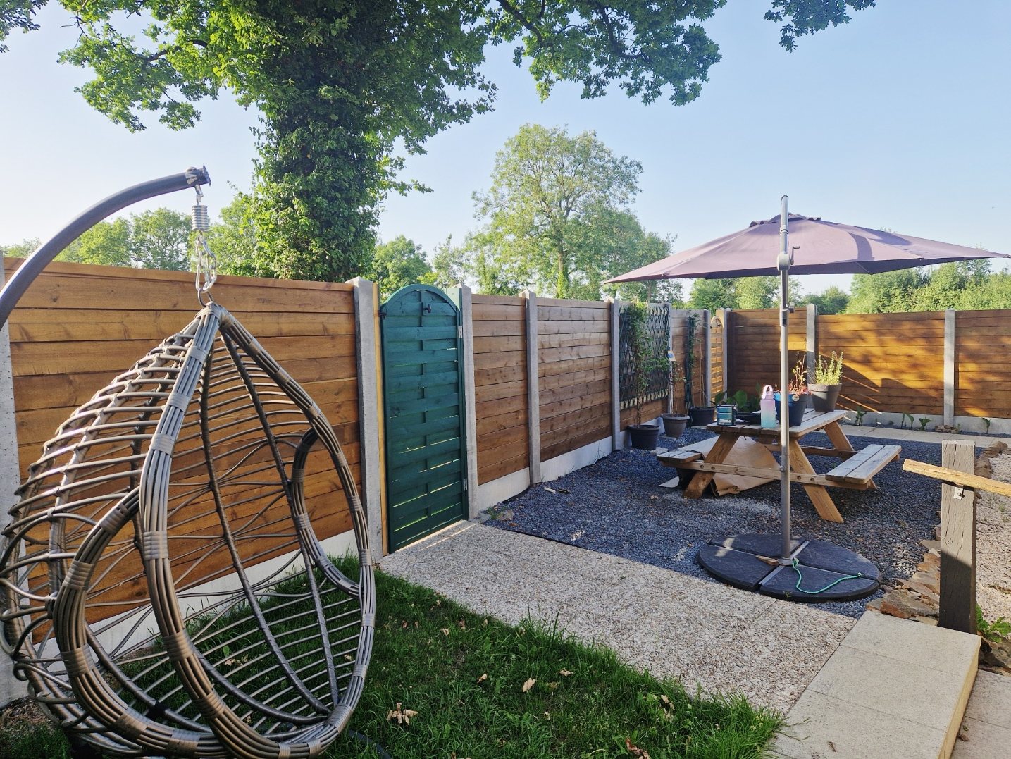 Secure private garden with dining area and BBQ